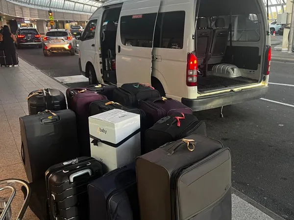 Our van at the Sydney Airport kerb with a full load of luggage